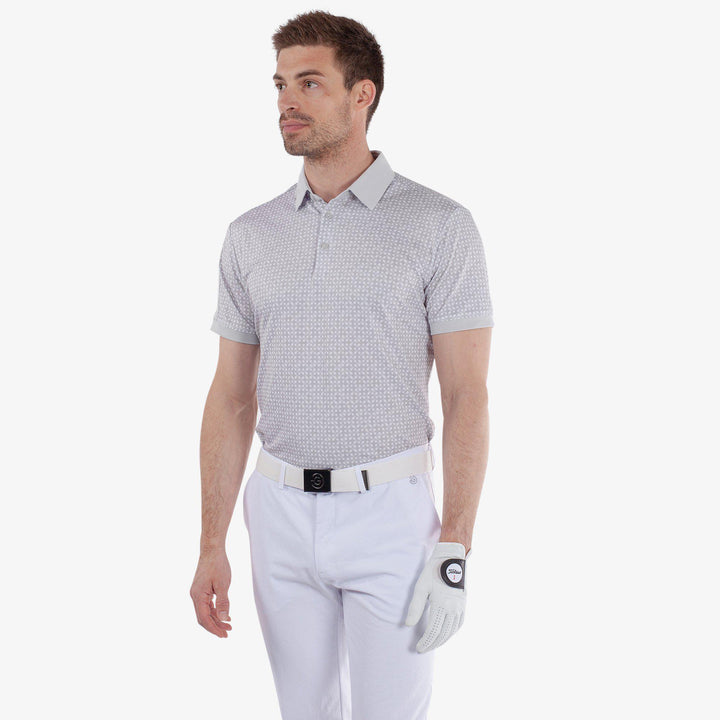 Melvin is a Breathable short sleeve golf shirt for Men in the color Cool Grey/White(1)