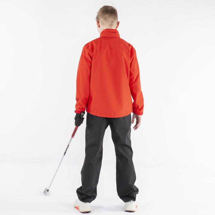 Robert is a Waterproof golf jacket for Juniors in the color Red(6)