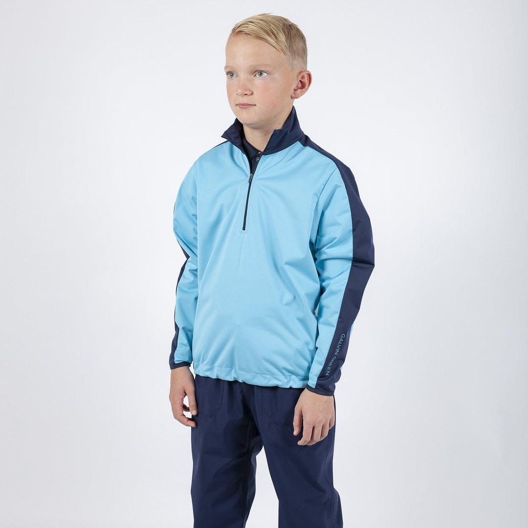 Roma is a Windproof and water repellent golf jacket for Juniors in the color Blue Bell(1)