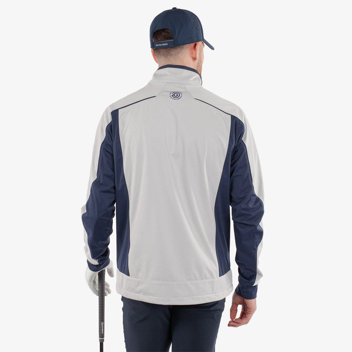 Lyndon is a Windproof and water repellent golf jacket for Men in the color Cool Grey/Navy(5)