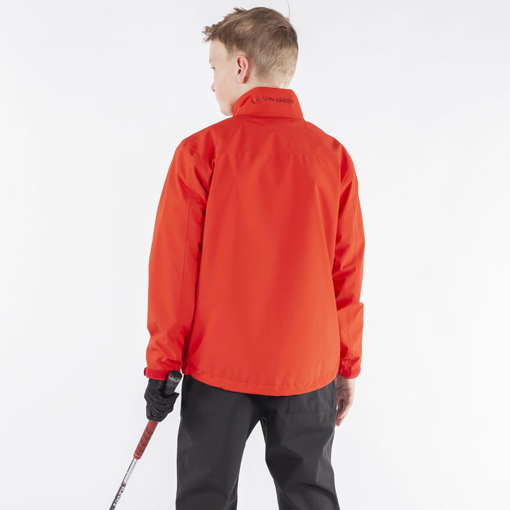 Robert is a Waterproof golf jacket for Juniors in the color Red(4)