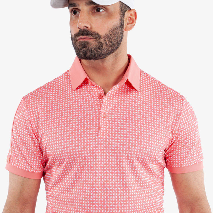 Melvin is a Breathable short sleeve golf shirt for Men in the color Coral/White (3)