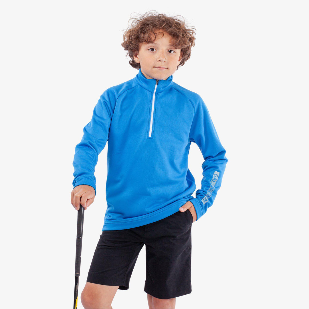 Raz is a Insulating golf mid layer for Juniors in the color Blue(1)