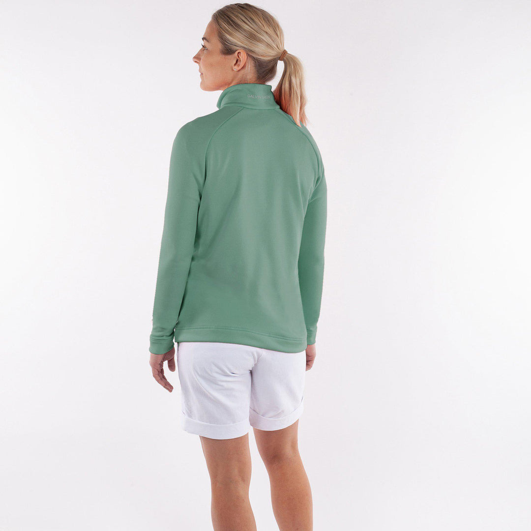 Dolly Upcycled is a Insulating golf mid layer for Women in the color Golf Green(4)