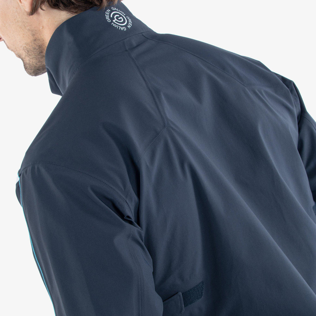 Armstrong is a Waterproof golf jacket for Men in the color Navy/Aqua/White(7)