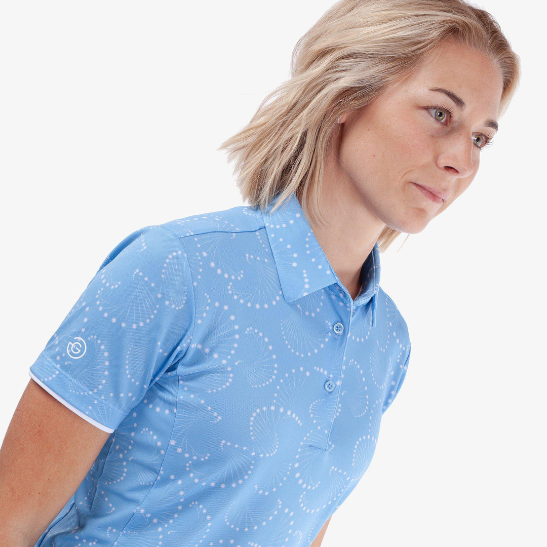 Mandy is a Breathable short sleeve golf shirt for Women in the color Alaskan Blue/White(3)