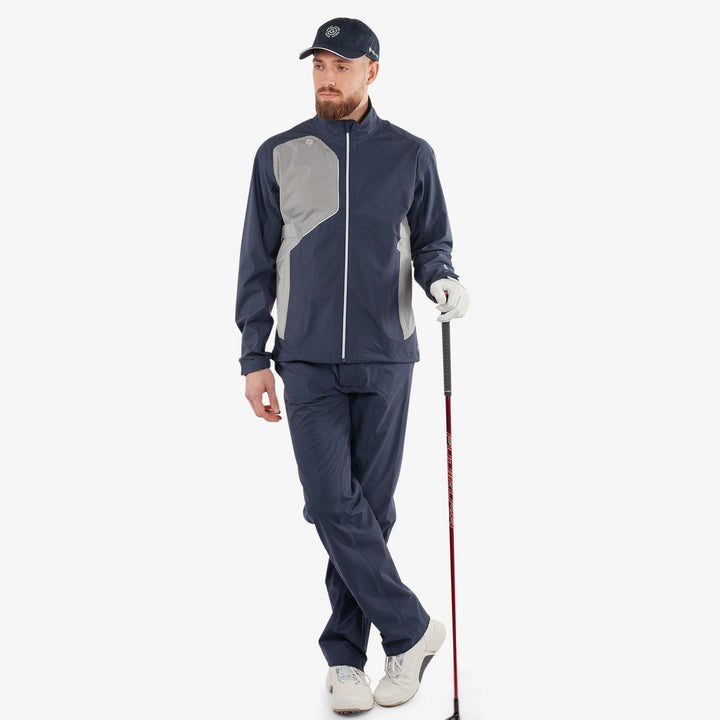 Ames is a Waterproof golf jacket for Men in the color Navy/Cool Grey(2)