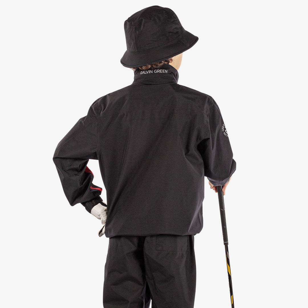 Robert is a Waterproof golf jacket for Juniors in the color Black/Red(6)