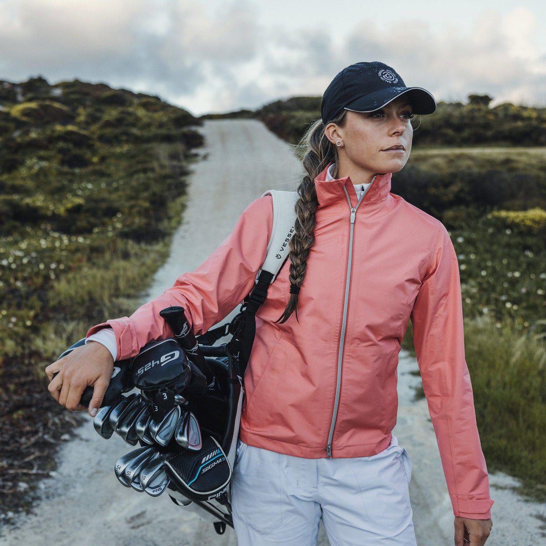 Alice is a Waterproof golf jacket for Women in the color Sugar Coral(9)