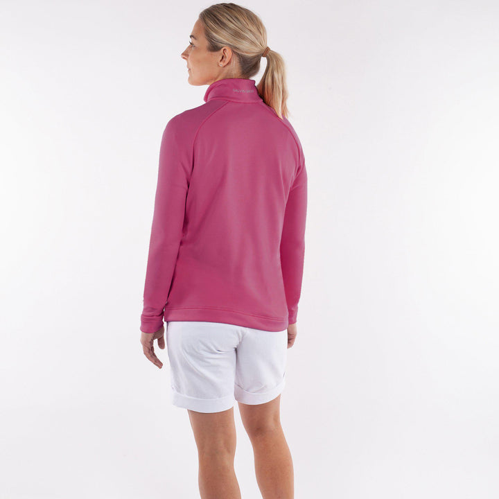 Dolly Upcycled is a Insulating golf mid layer for Women in the color Fantastic Pink(4)