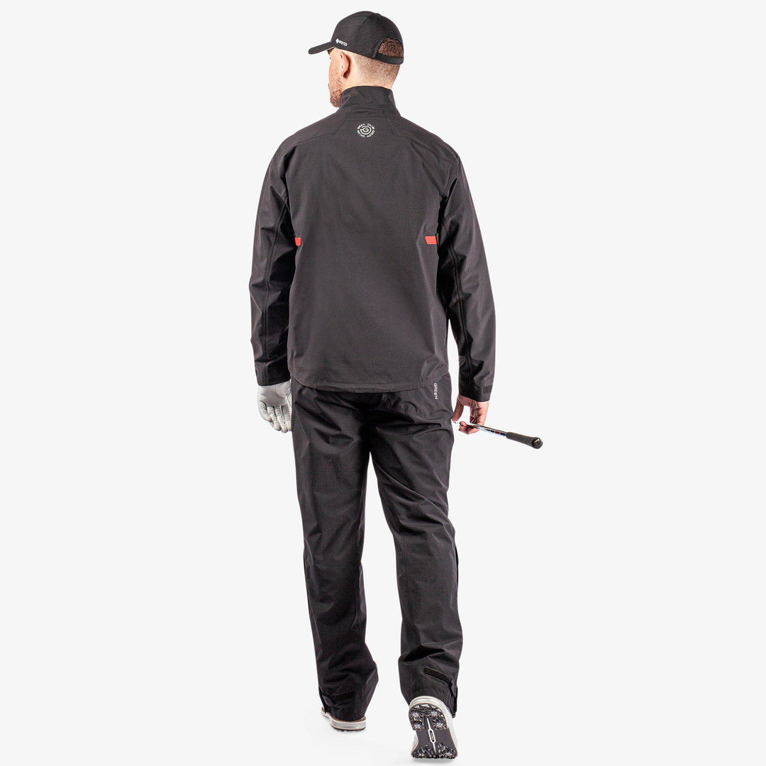 Ashford is a Waterproof golf jacket for Men in the color Black/Red(9)