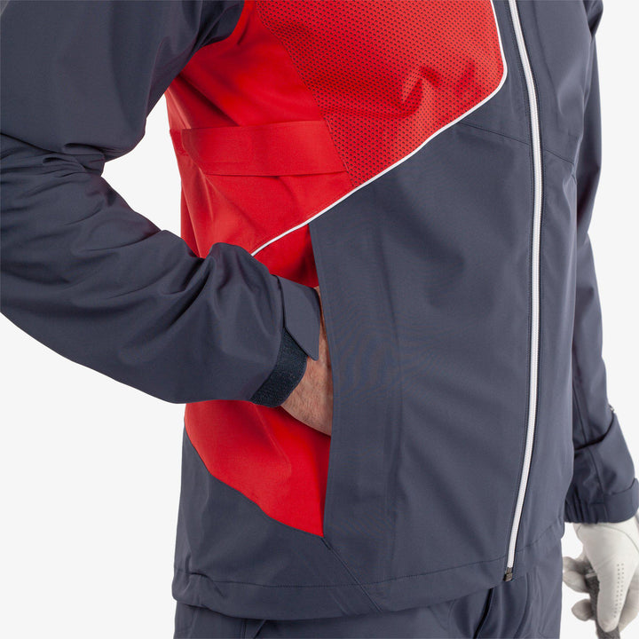 Ames is a Waterproof golf jacket for Men in the color Navy/Red(4)