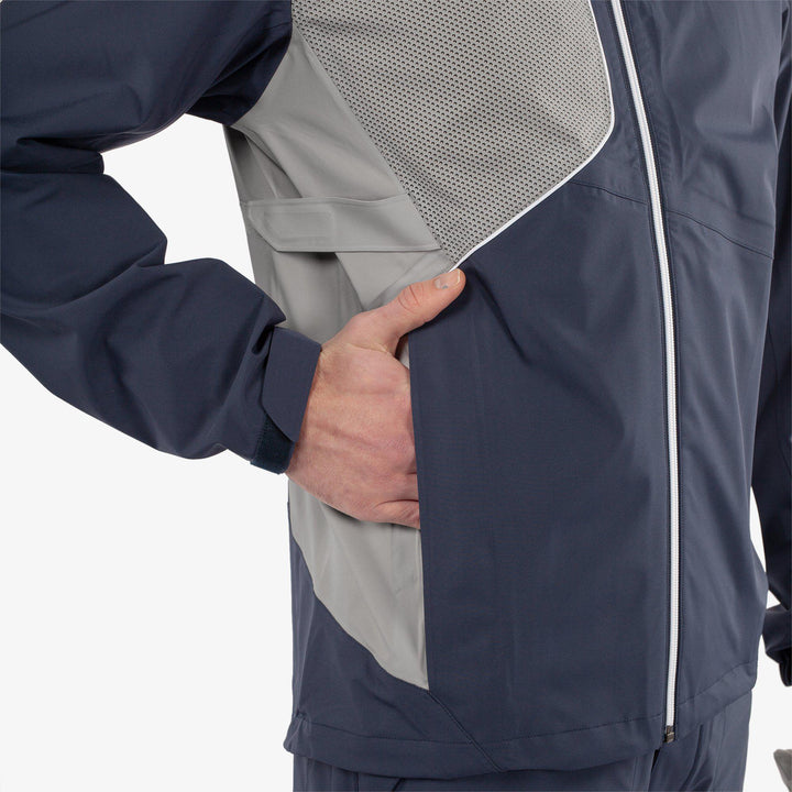 Ames is a Waterproof golf jacket for Men in the color Navy/Cool Grey(6)