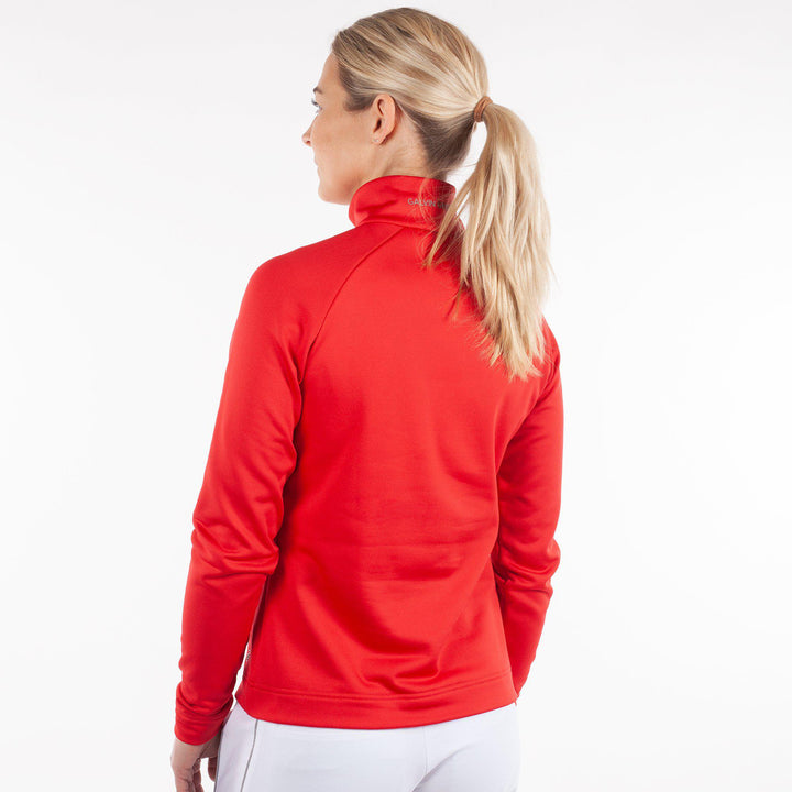 Dolly is a Insulating mid golf layer for Women in the color Red(3)