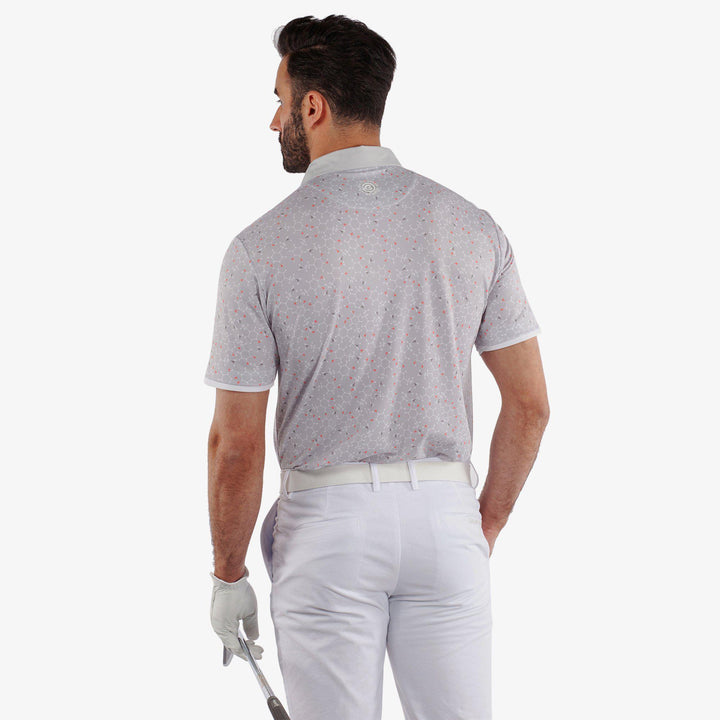 Mannix is a Breathable short sleeve golf shirt for Men in the color Cool Grey/Coral(4)