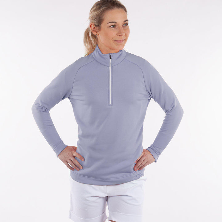 Dolly Upcycled is a Insulating golf mid layer for Women in the color Amazing Pink(1)