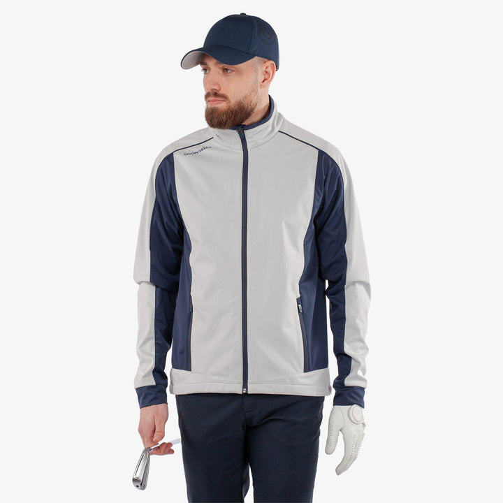 Lyndon is a Windproof and water repellent golf jacket for Men in the color Cool Grey/Navy(1)