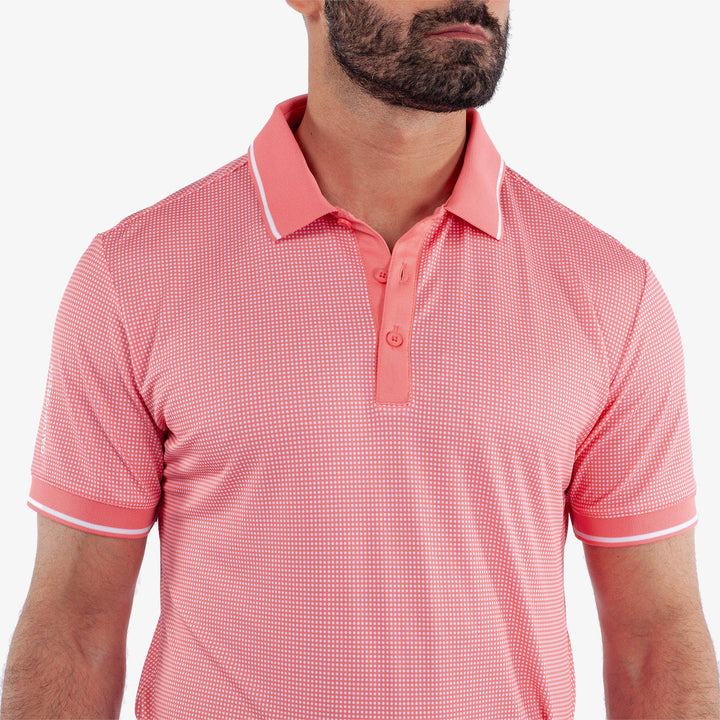 Miller is a Breathable short sleeve golf shirt for Men in the color Coral/White (3)