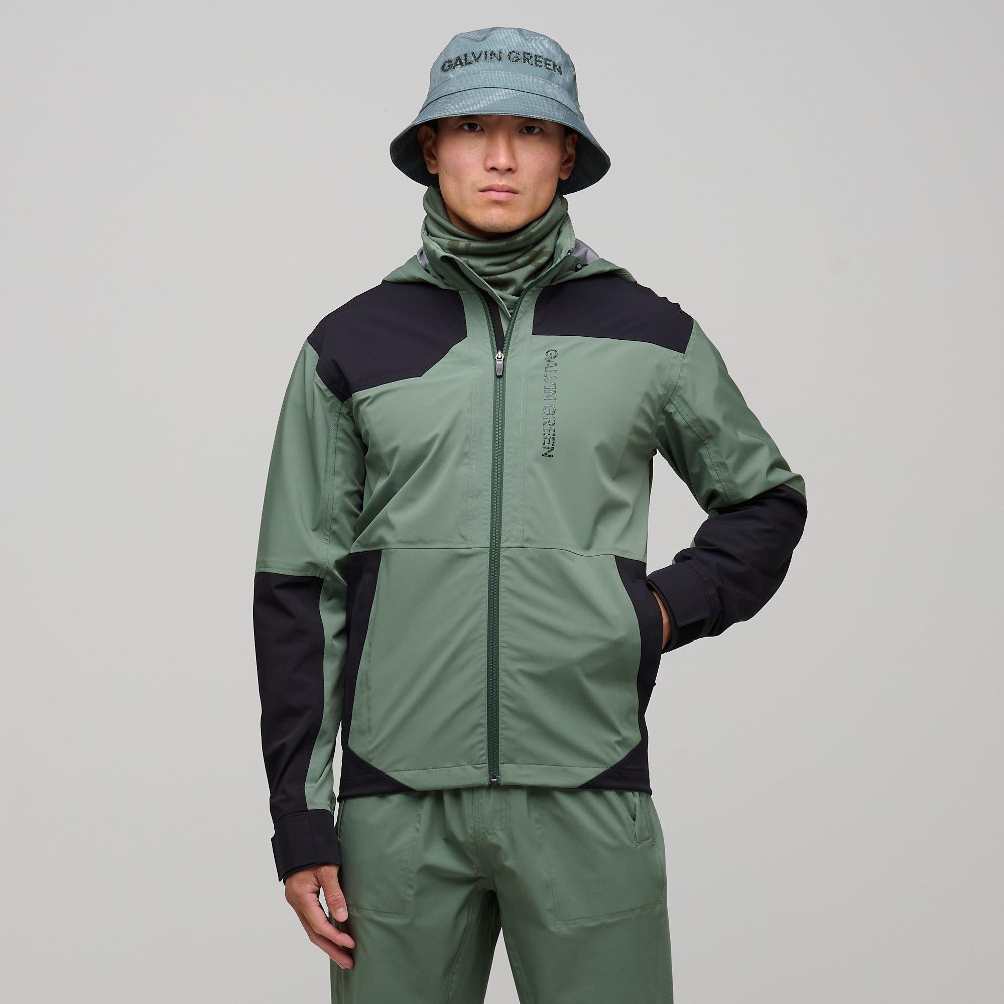 Washing galvin green waterproofs top