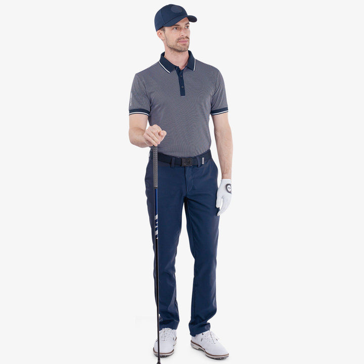 Miller is a Breathable short sleeve golf shirt for Men in the color Navy/White(2)