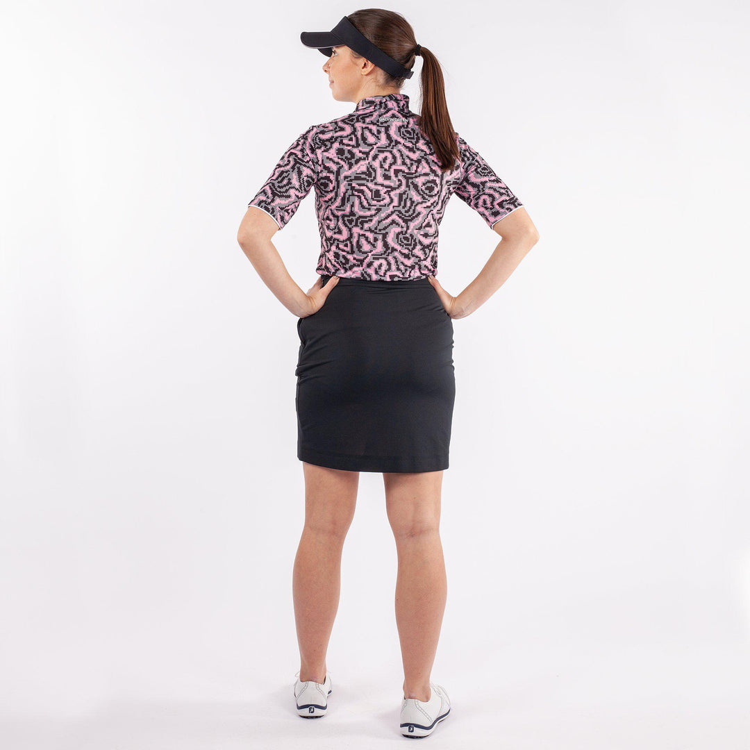 Marissa is a Breathable short sleeve golf shirt for Women in the color Fantastic Pink(4)