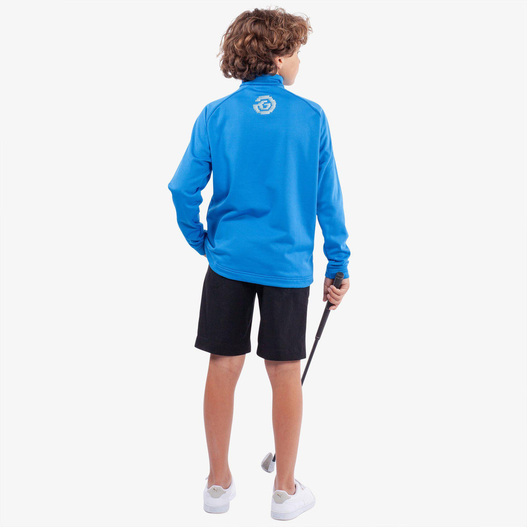Raz is a Insulating golf mid layer for Juniors in the color Blue(6)