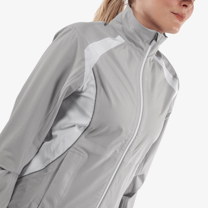 Amy is a Waterproof golf jacket for Women in the color Cool Grey/White(3)