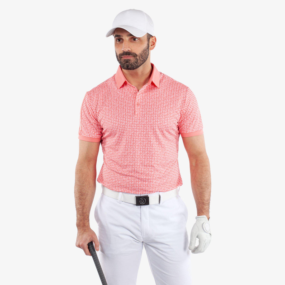 Melvin is a Breathable short sleeve golf shirt for Men in the color Coral/White (1)