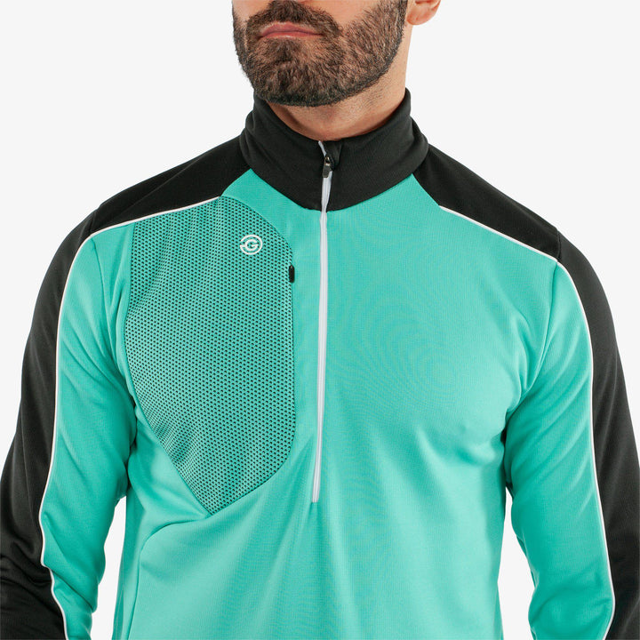 Dave is a Insulating golf mid layer for Men in the color Black/Atlantis Green(3)