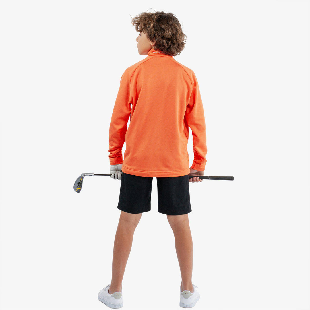 Raz is a Insulating golf mid layer for Juniors in the color Orange(6)