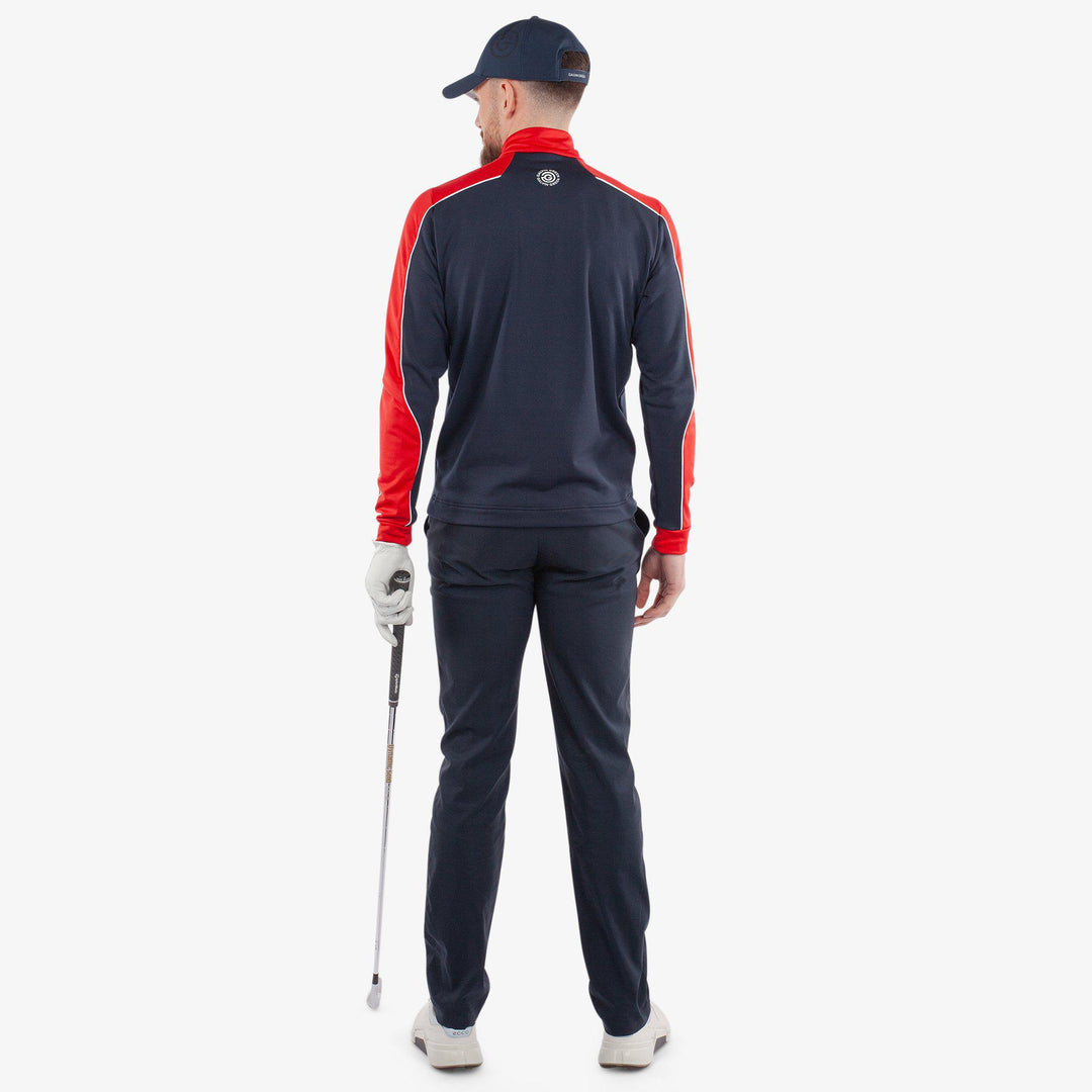 Dave is a Insulating golf mid layer for Men in the color Navy/Red(7)