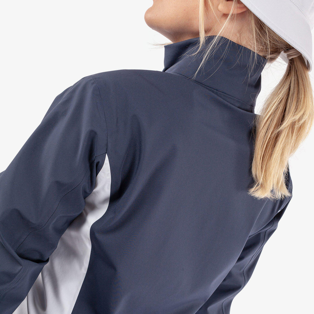 Amy is a Waterproof golf jacket for Women in the color Navy/White(6)