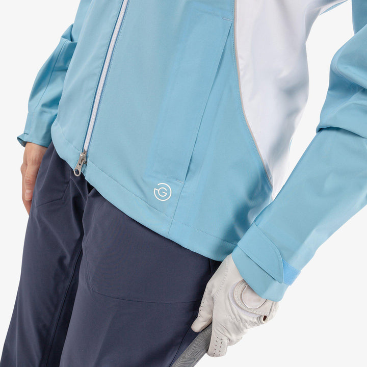 Amy is a Waterproof golf jacket for Women in the color Alaskan Blue/White(4)