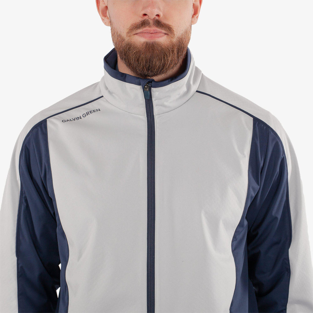 Lyndon is a Windproof and water repellent golf jacket for Men in the color Cool Grey/Navy(4)