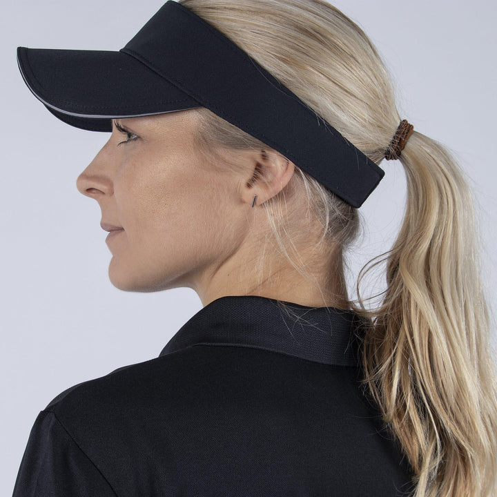 Mireya is a Breathable short sleeve golf shirt for Women in the color Black(2)