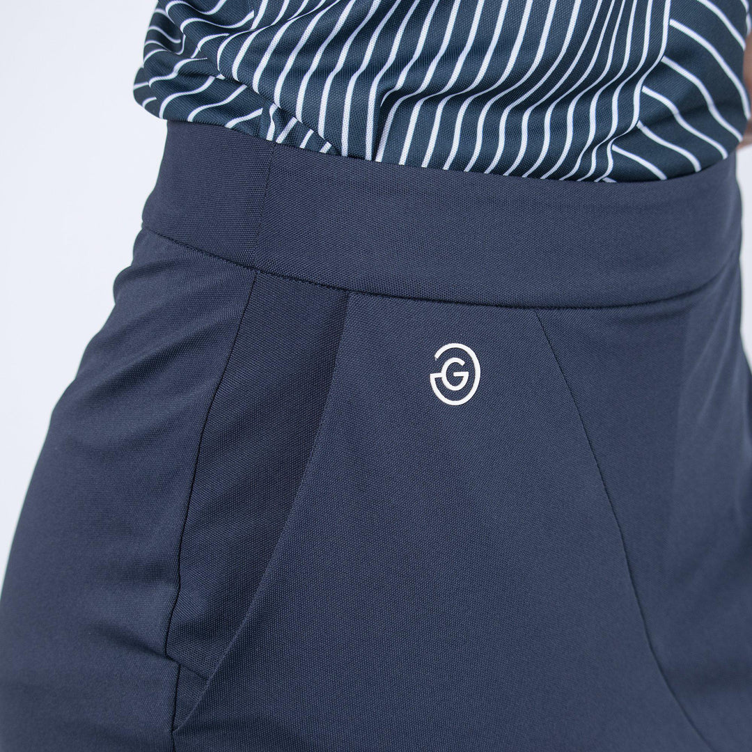 Masey is a Breathable golf skirt with inner shorts for Women in the color Navy(2)