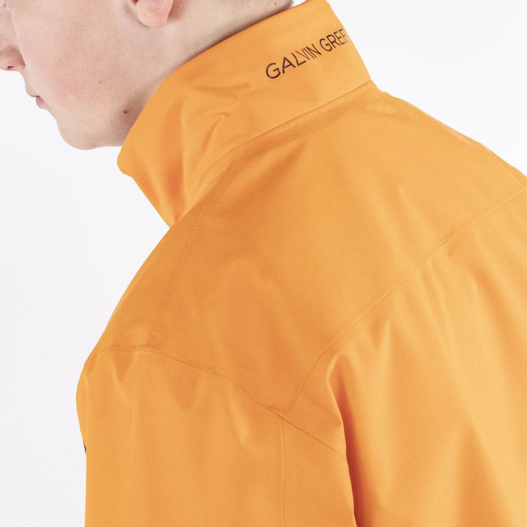 Robert is a Waterproof golf jacket for Juniors in the color Orange(5)