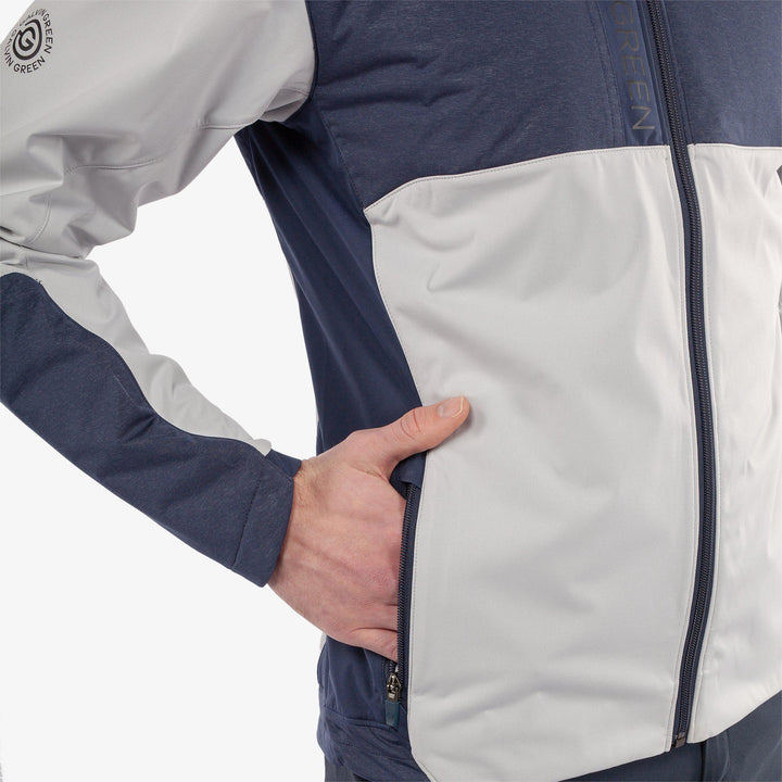 Layton is a Windproof and water repellent golf jacket for Men in the color Cool Grey/Navy(5)