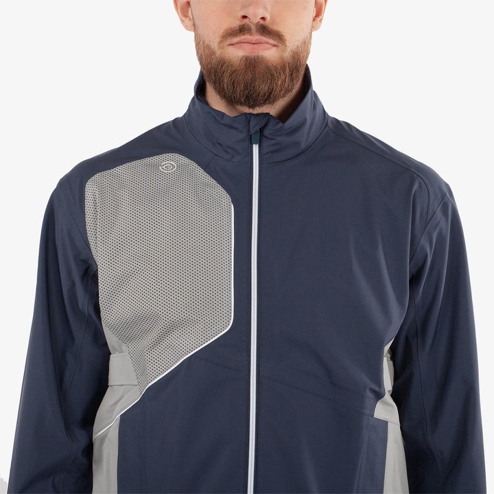 Ames is a Waterproof golf jacket for Men in the color Navy/Cool Grey(5)