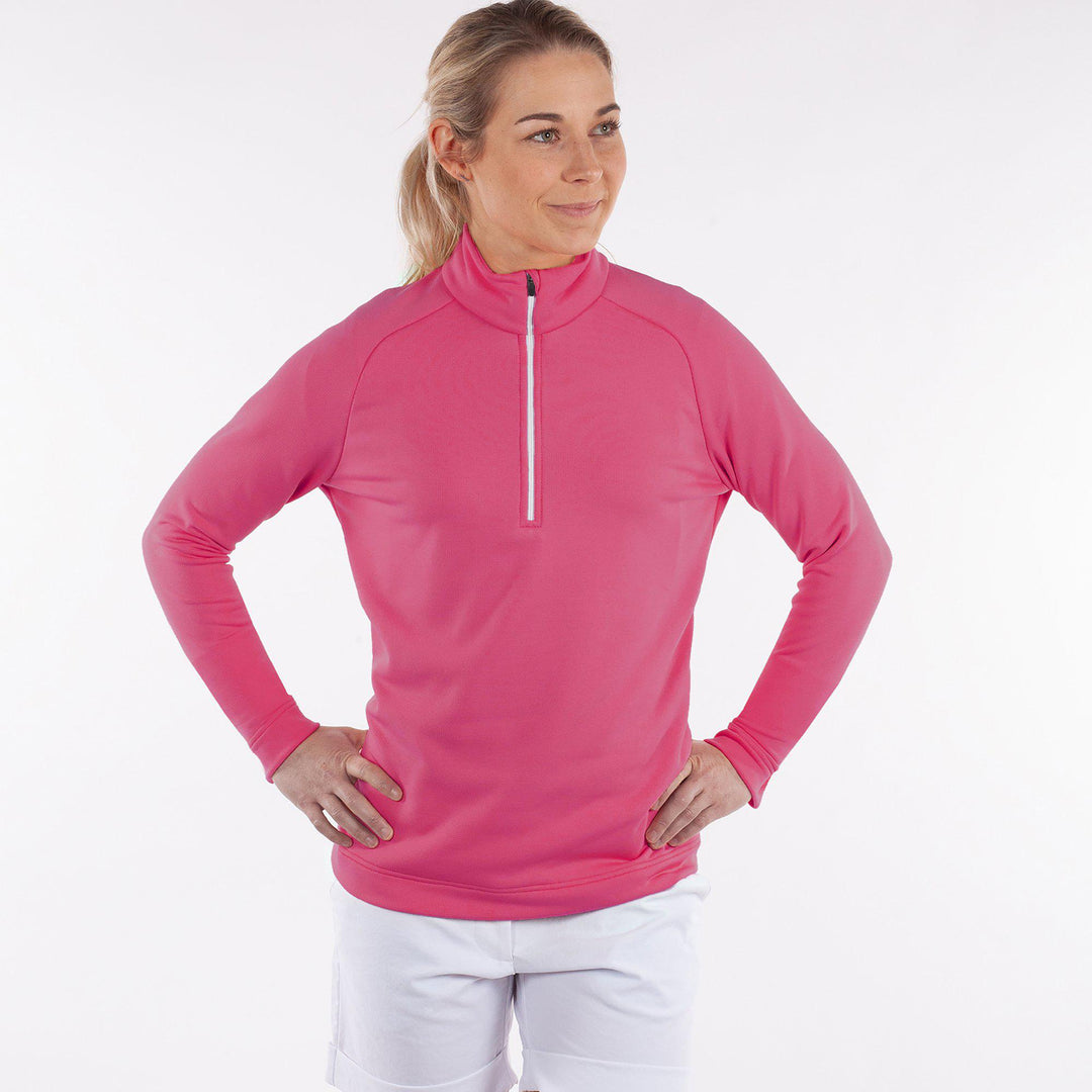 Dolly Upcycled is a Insulating golf mid layer for Women in the color Sugar Coral(1)