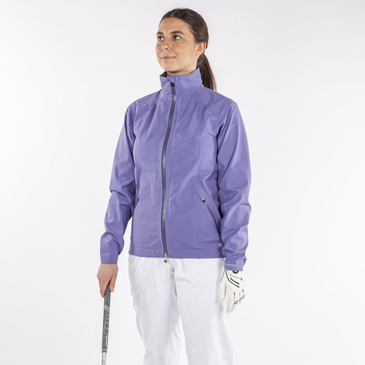 Adele is a Waterproof golf jacket for Women in the color Sugar Coral(3)