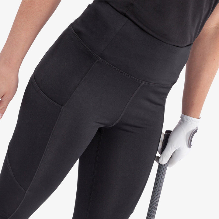 Nicoline is a Breathable and stretchy golf leggings for Women in the color Black(3)