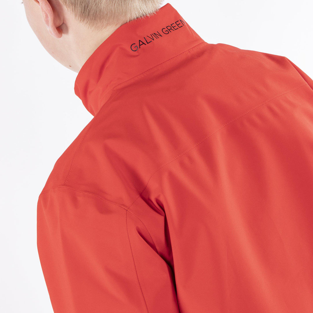 Robert is a Waterproof golf jacket for Juniors in the color Red(5)