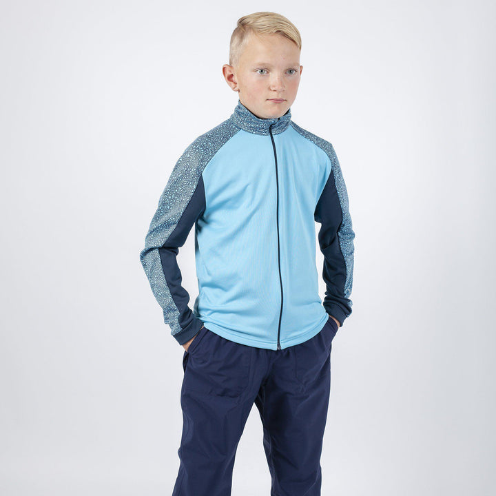 Rick is a Insulating golf mid layer for Juniors in the color Blue Bell(1)