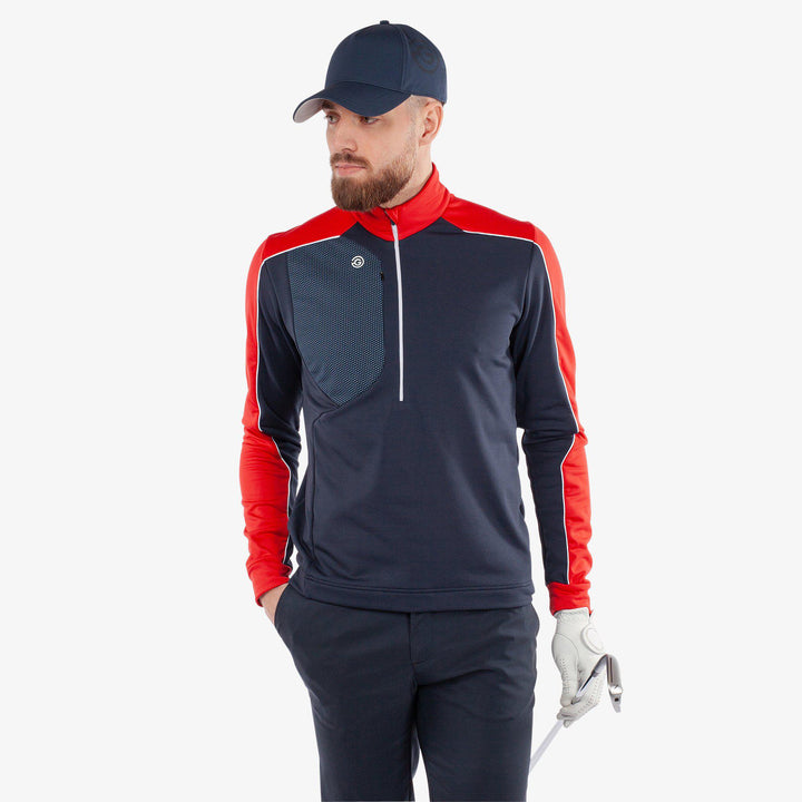 Dave is a Insulating golf mid layer for Men in the color Navy/Red(1)