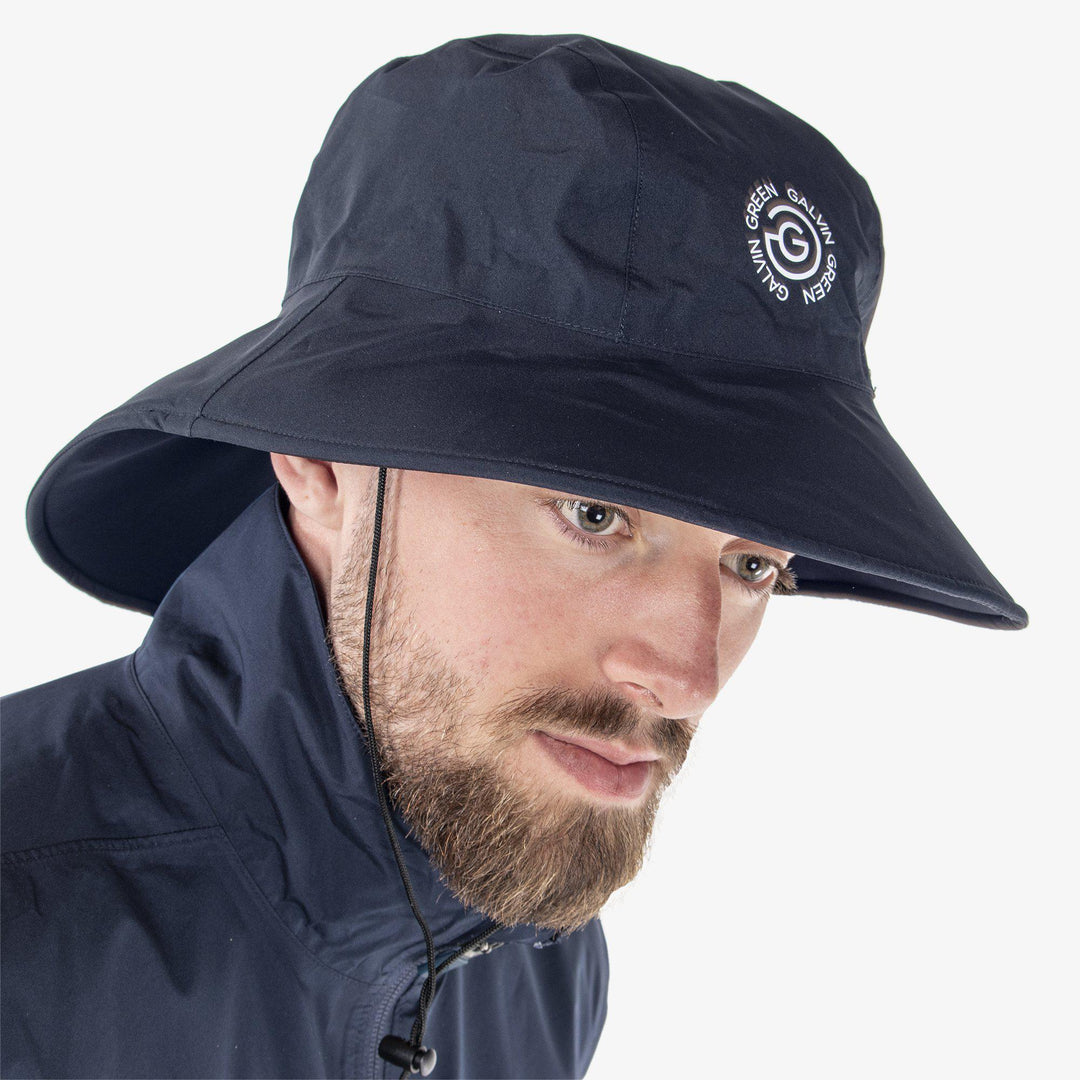 Art is a Waterproof golf hat in the color Navy(2)