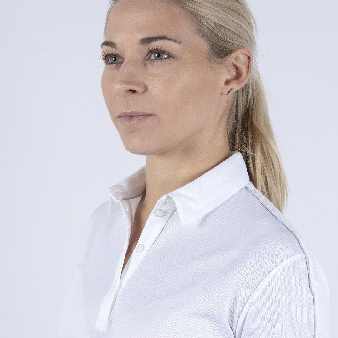 Mary is a Breathable long sleeve golf shirt for Women in the color White(2)