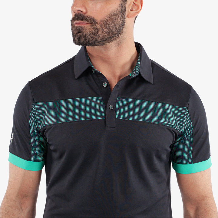 Mills is a Breathable short sleeve golf shirt for Men in the color Black/Atlantis Green(3)