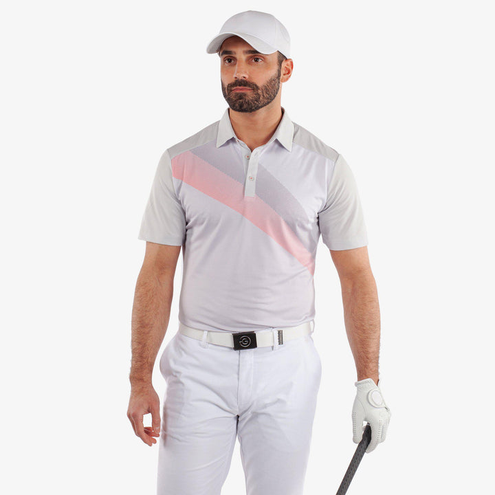 Macoy is a Breathable short sleeve golf shirt for Men in the color Cool Grey/Coral(1)