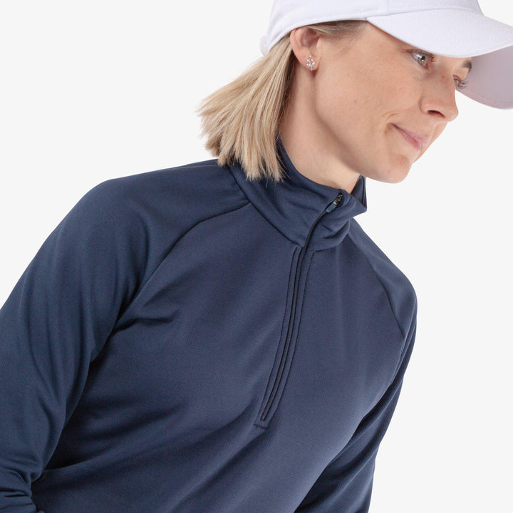 Dolly is a Insulating golf mid layer for Women in the color Navy(3)